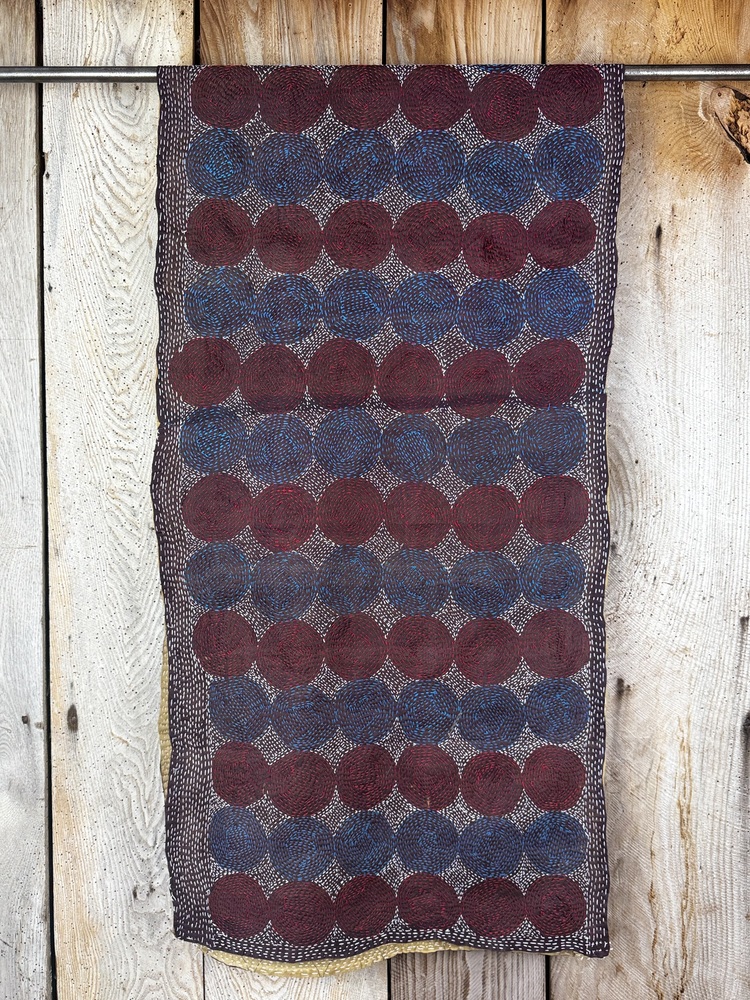 Silk scarf made from hand-stitched recycled sari silk.