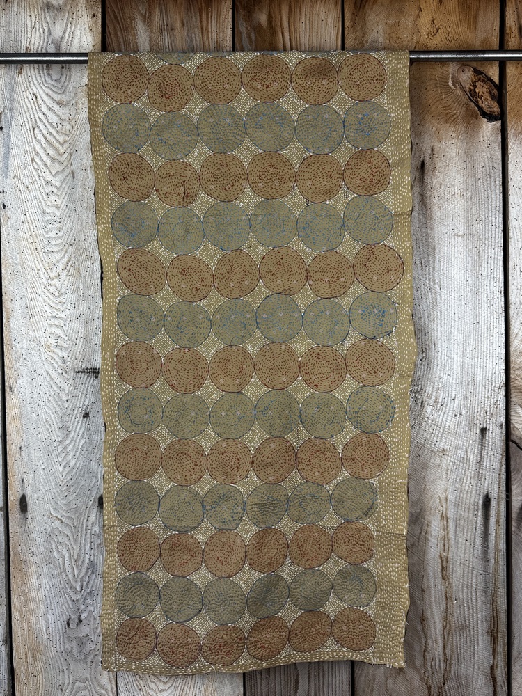 Silk scarf made from hand-stitched recycled sari silk.