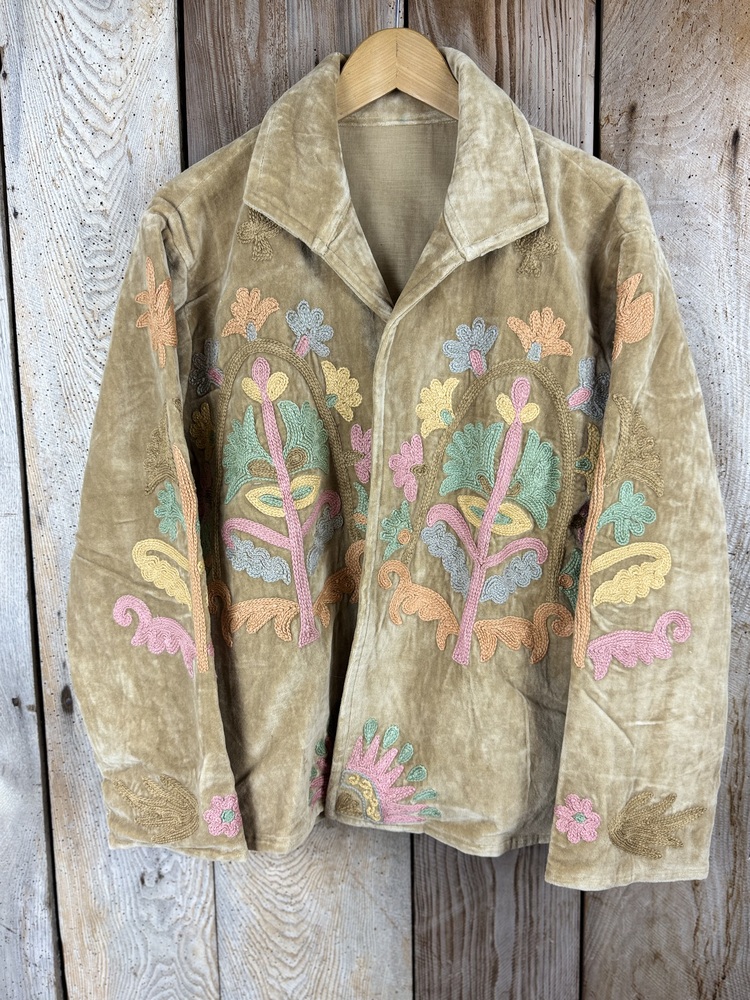 Hand embroidered cotton velvet jacket with soft texture, cosy easy fit, and intricate artisanal detailing.