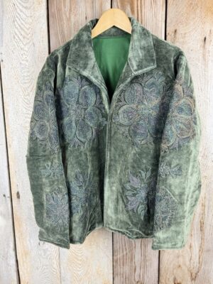 Hand embroidered cotton velvet jacket with soft texture, cosy easy fit, and intricate artisanal detailing.