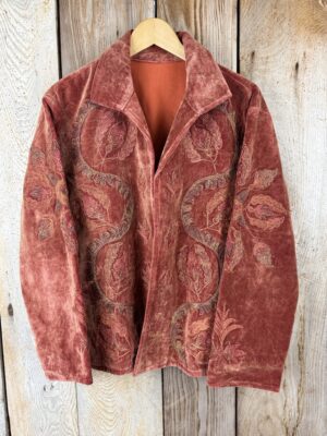 Hand embroidered cotton velvet jacket with soft texture, cosy easy fit, and intricate artisanal detailing.