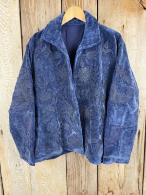 Hand embroidered cotton velvet jacket with soft texture, cosy easy fit, and intricate artisanal detailing.