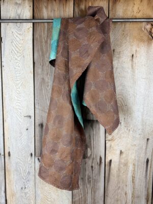 Silk scarf made from hand-stitched recycled sari silk.