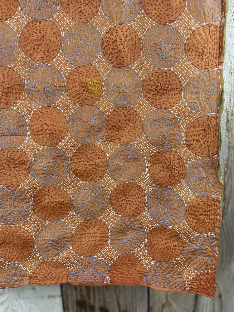 Silk scarf made from hand-stitched recycled sari silk.