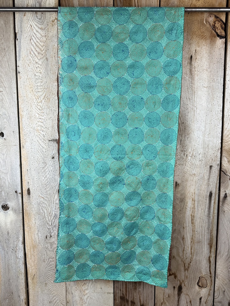 Silk scarf made from hand-stitched recycled sari silk.