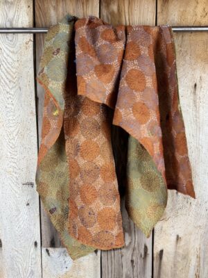 Silk scarf made from hand-stitched recycled sari silk.