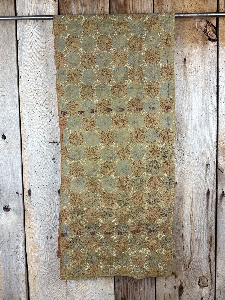 Silk scarf made from hand-stitched recycled sari silk.